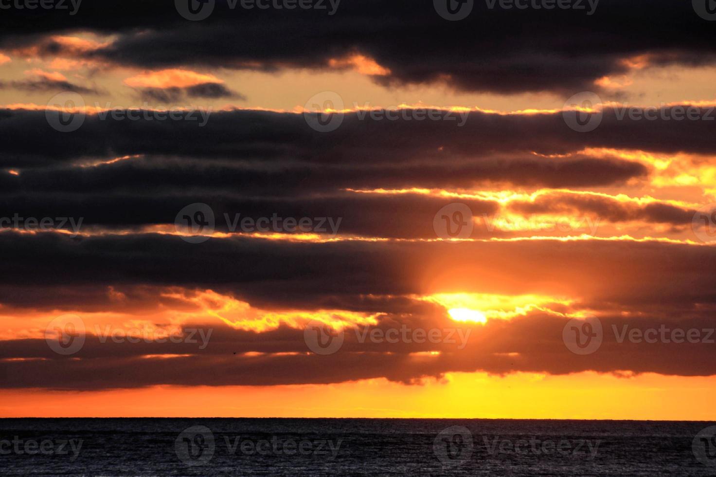Sunset over the sea photo