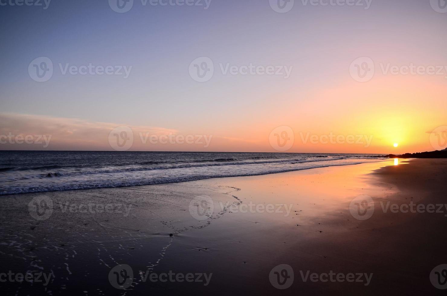 Sunset over the sea photo