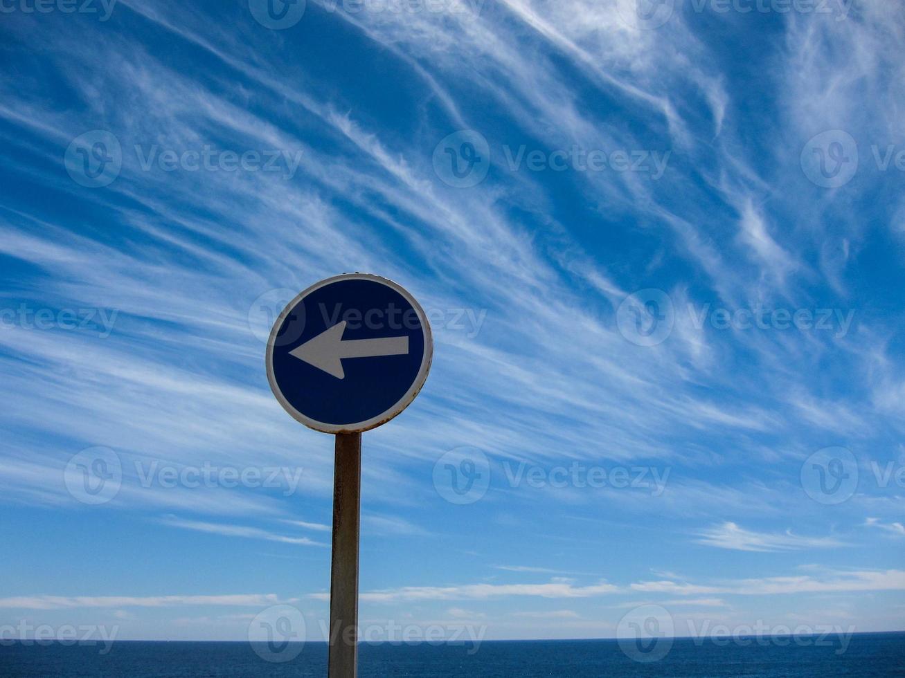 Blue sign with white arrow 21580637 Stock Photo at Vecteezy
