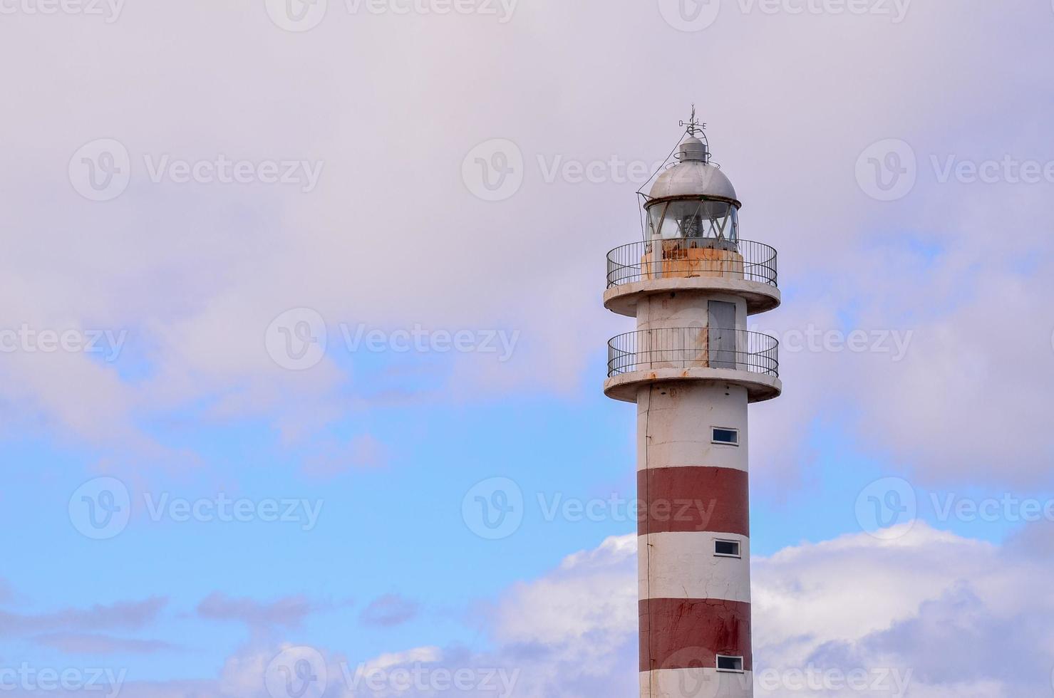 Red and white lighthouse photo