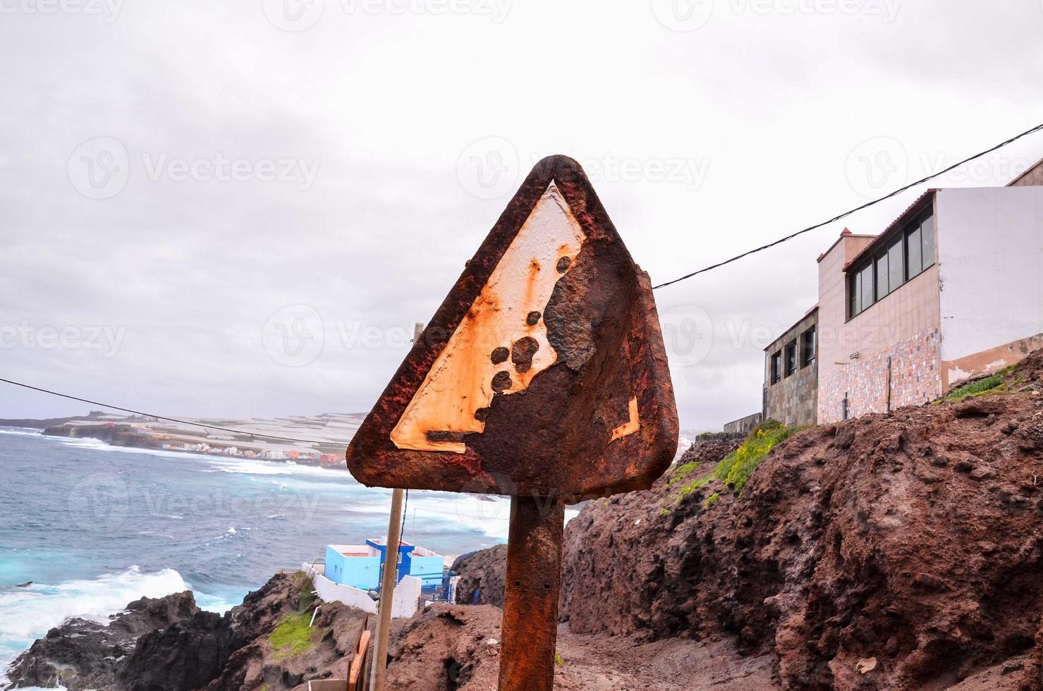 Rusty street sign photo