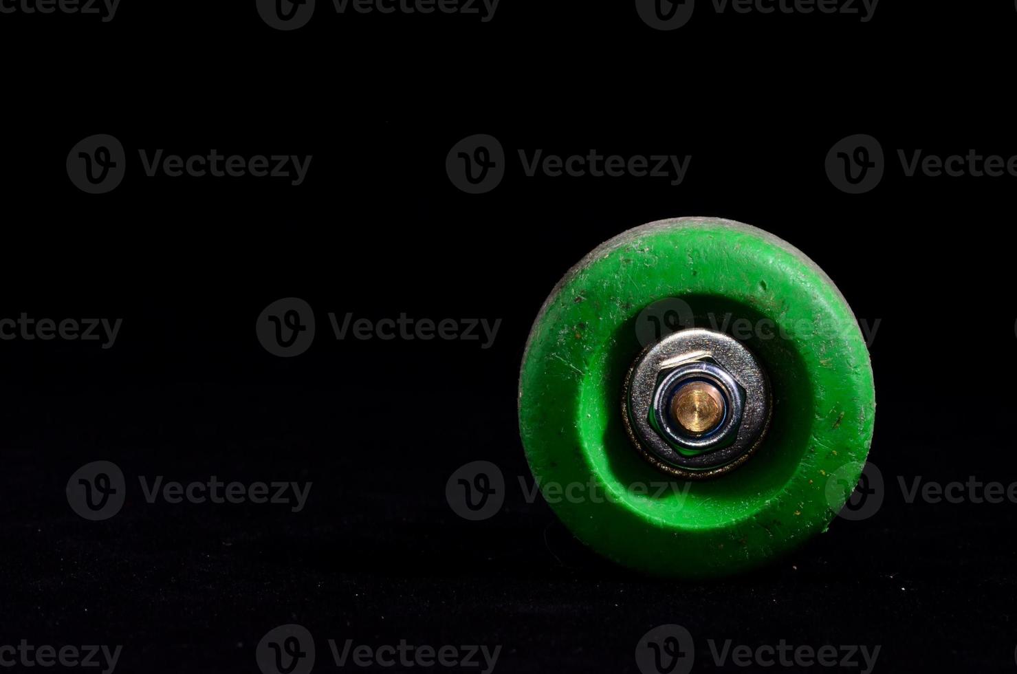 Skateboard wheels on dark background photo