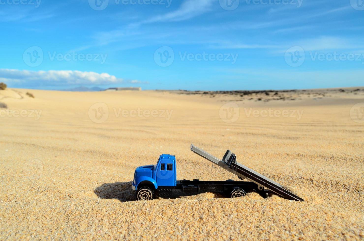 Toy truck in the sand photo
