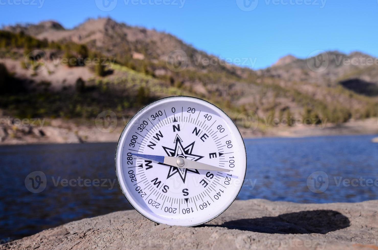 Small white compass photo