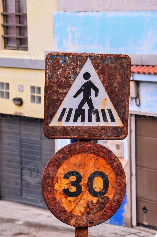 Rusty street sign photo