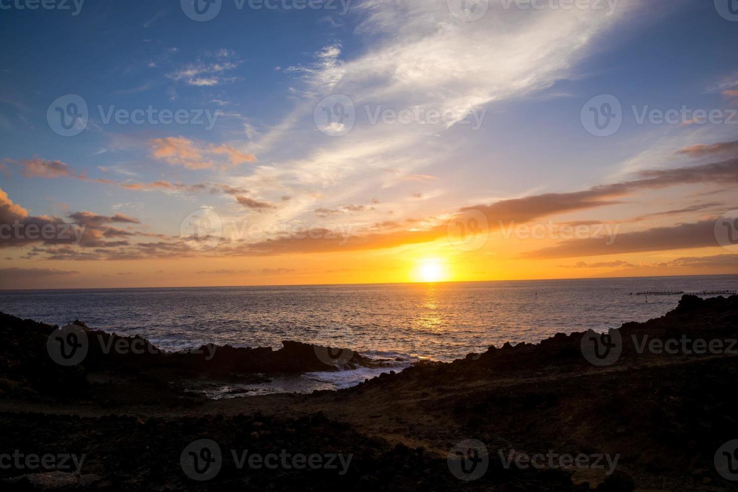 Sunset over the sea photo