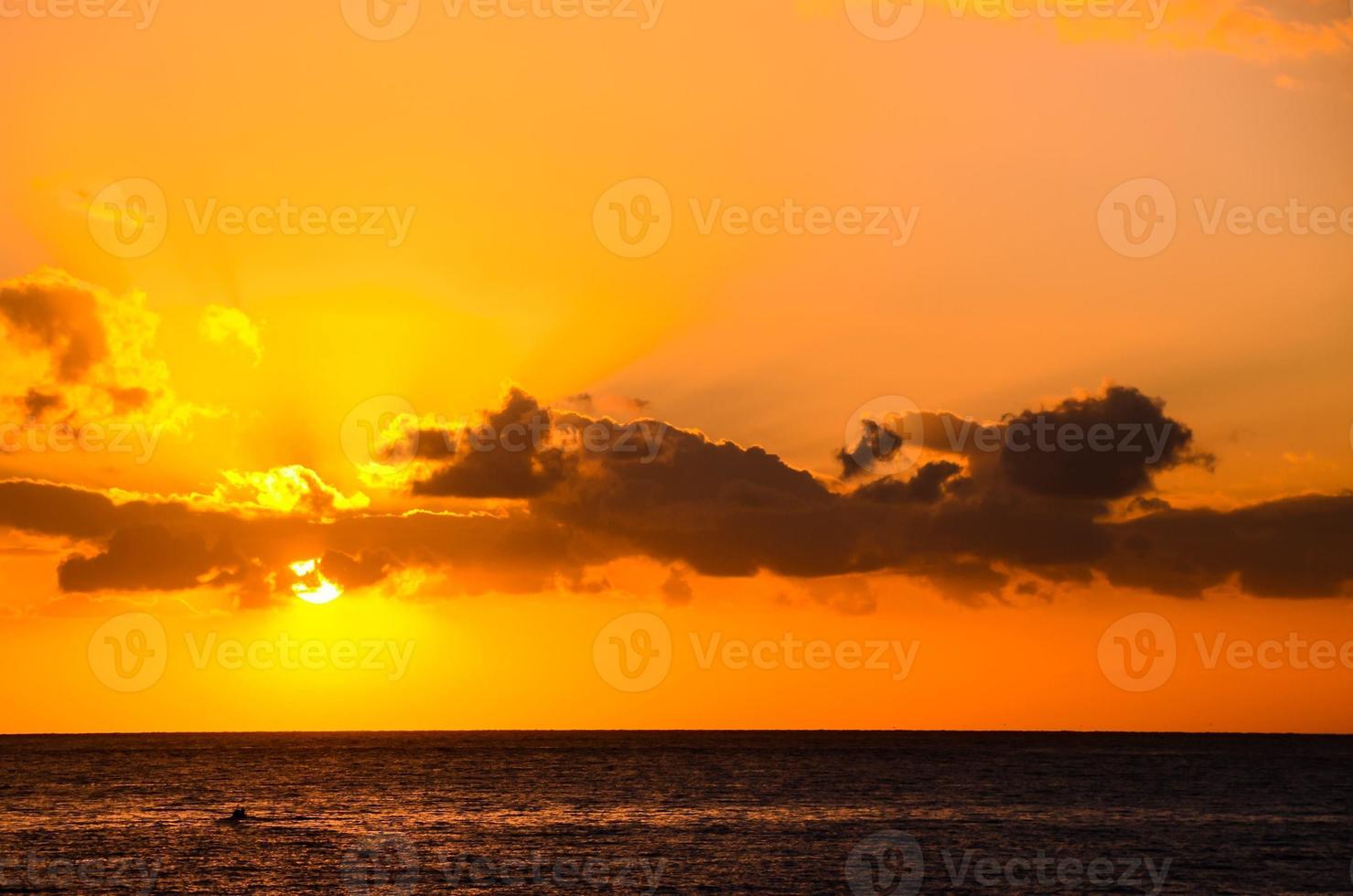 Sunset over the sea photo