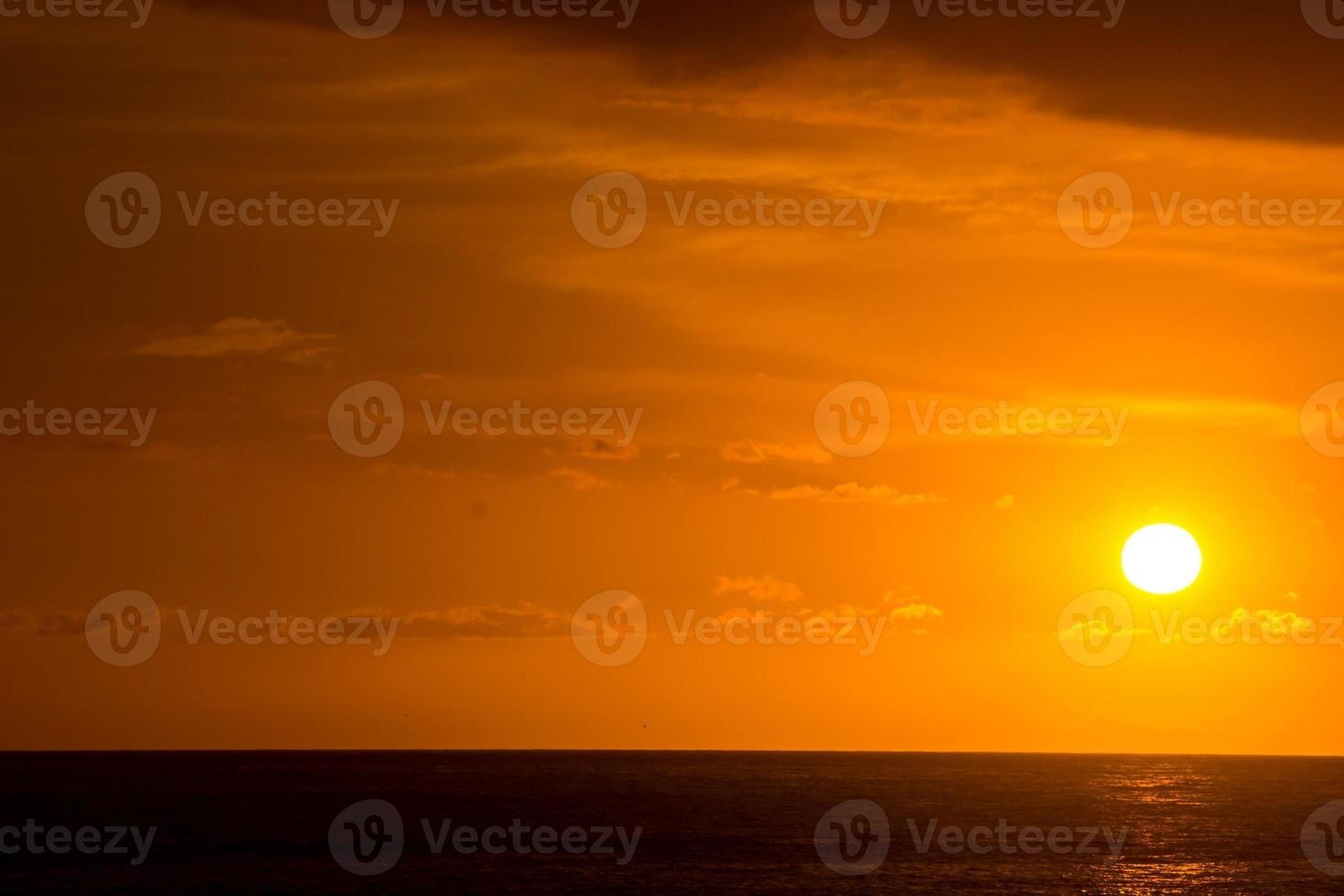 Sunset over the sea photo