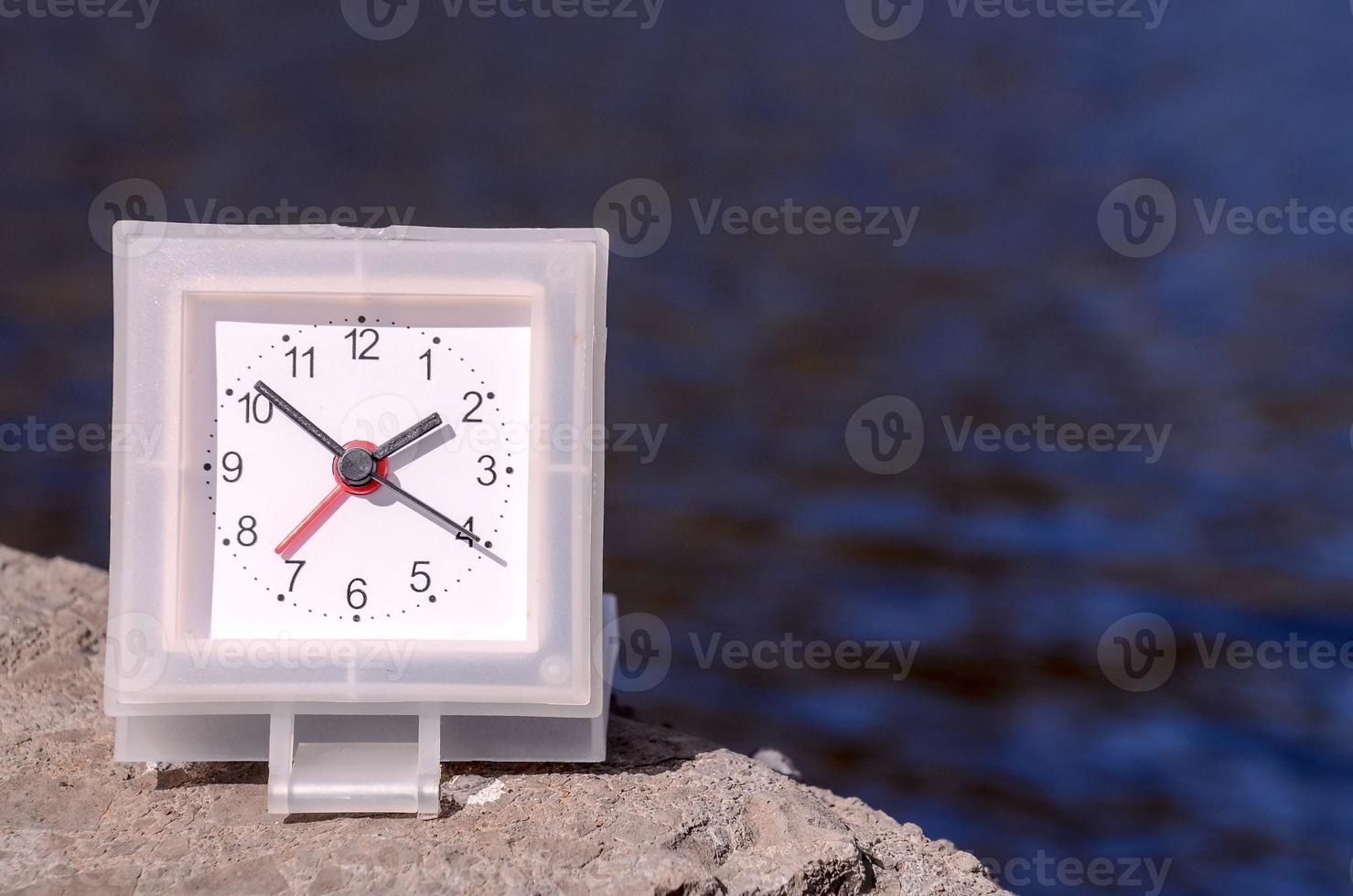 Clock on a rock photo