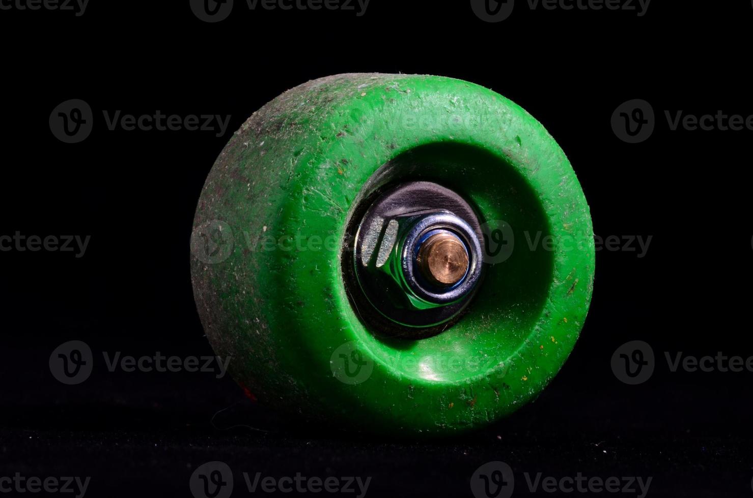 Skate wheel on dark background photo