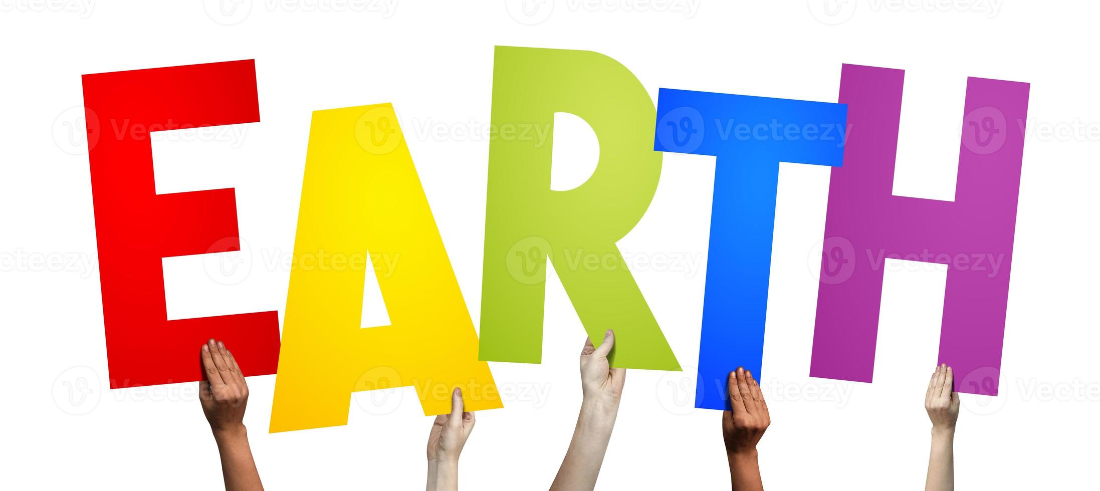 Earth - Human Hands Holding Colorful Letters photo