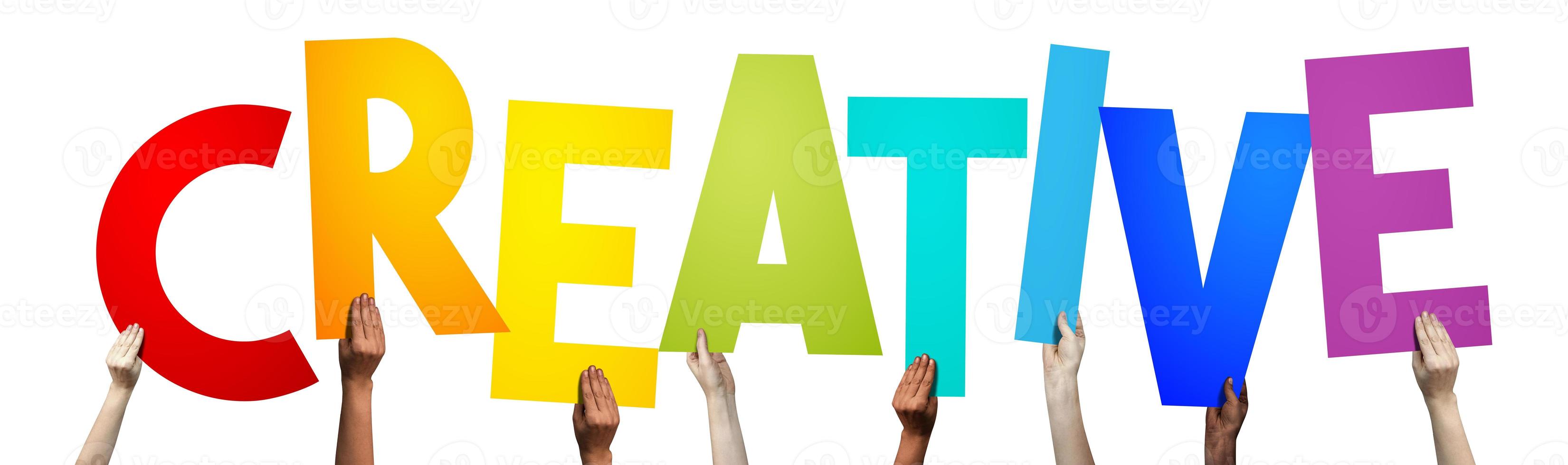 Creative - Human Hands Holding Colorful Letters photo