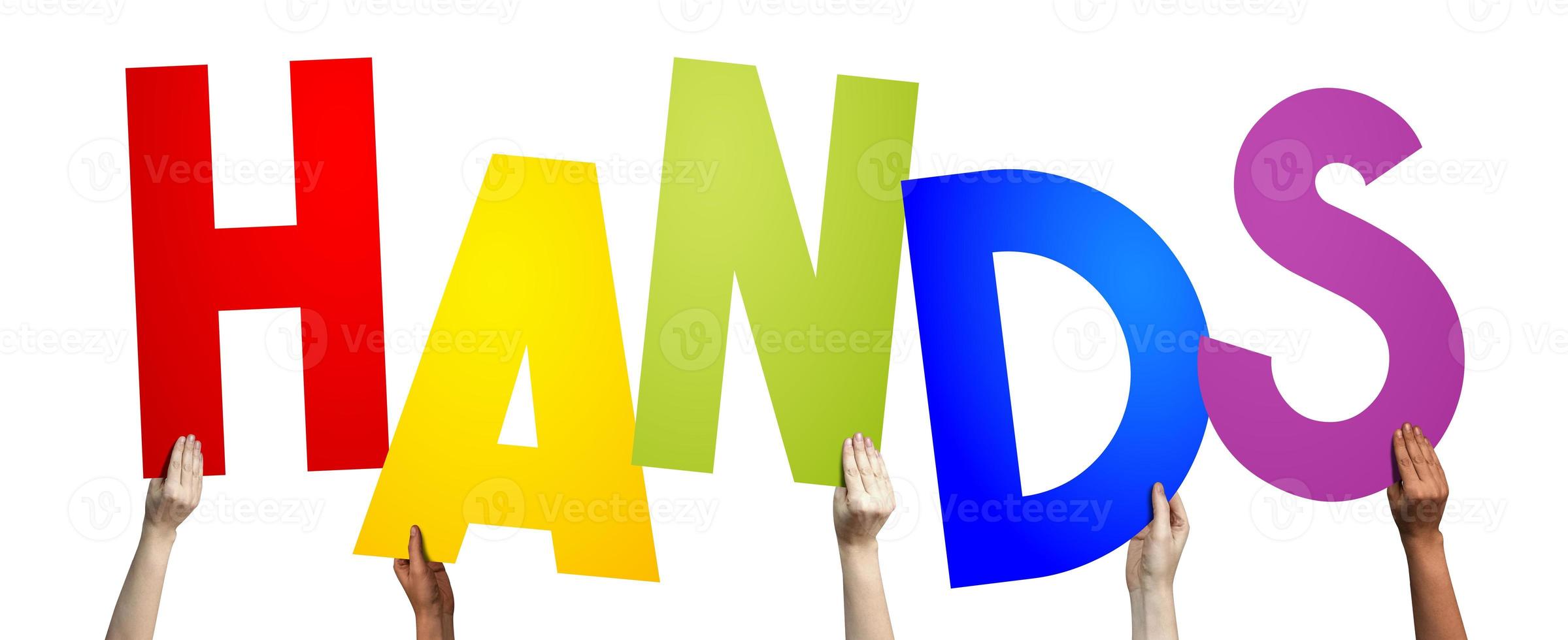 Hands - Human Hands Holding Colorful Letters photo