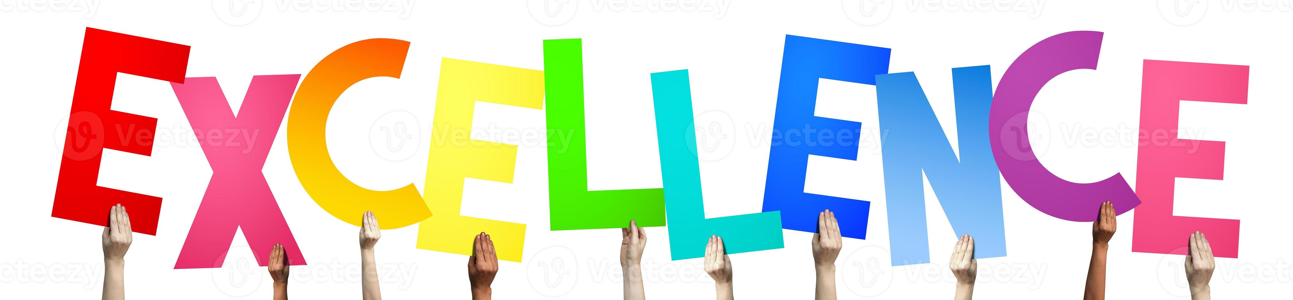 Excellence - Human Hands Holding Colorful Letters photo