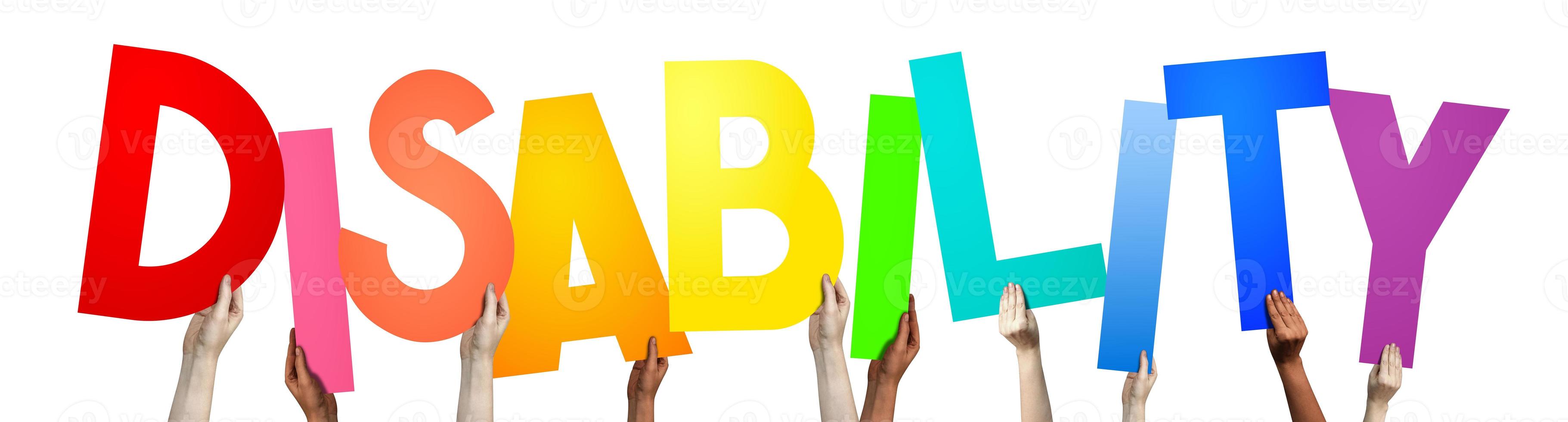 Disability - Human Hands Holding Colorful Letters photo