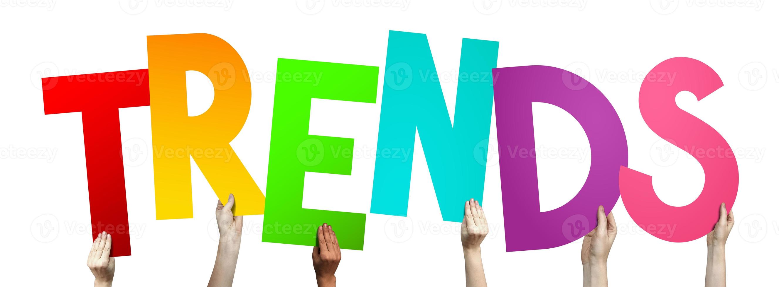 Trends - Human Hands Holding Colorful Letters photo