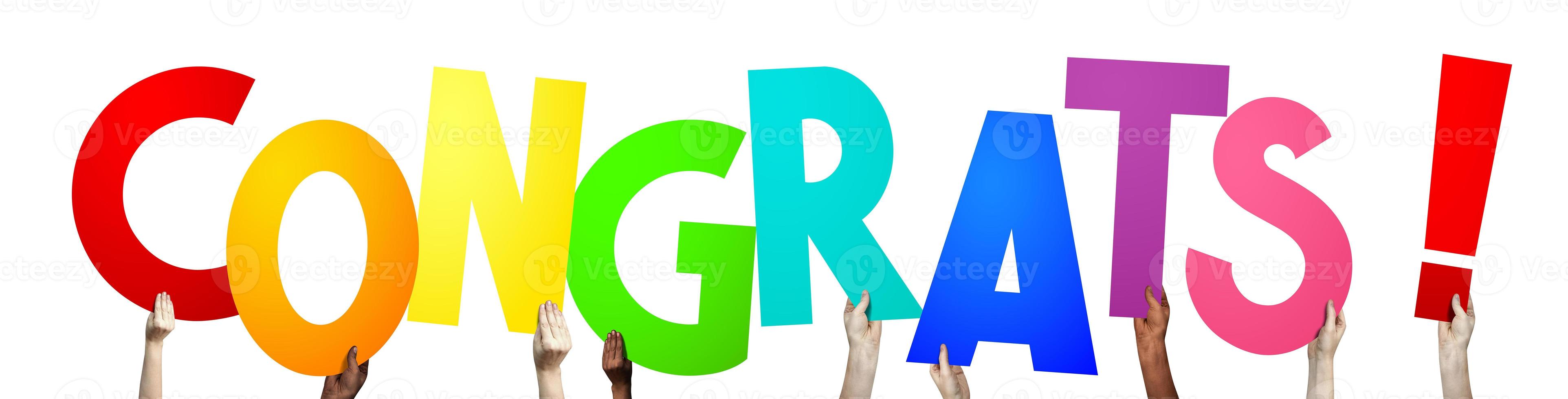 Congrats - Human Hands Holding Colorful Letters photo