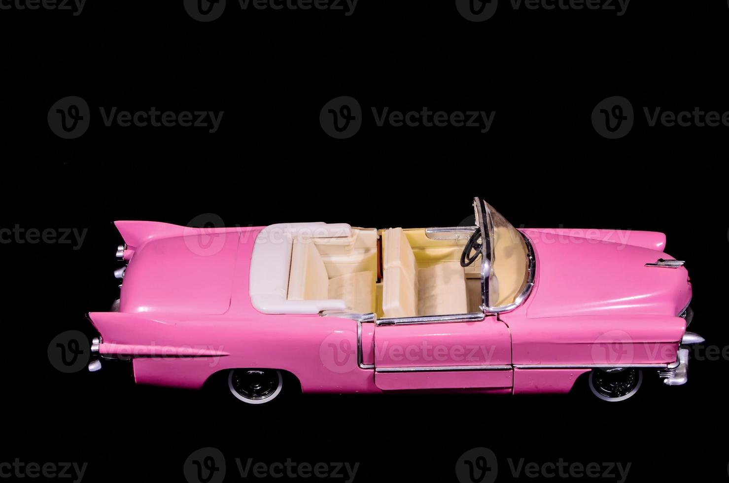 Toy car on dark background photo