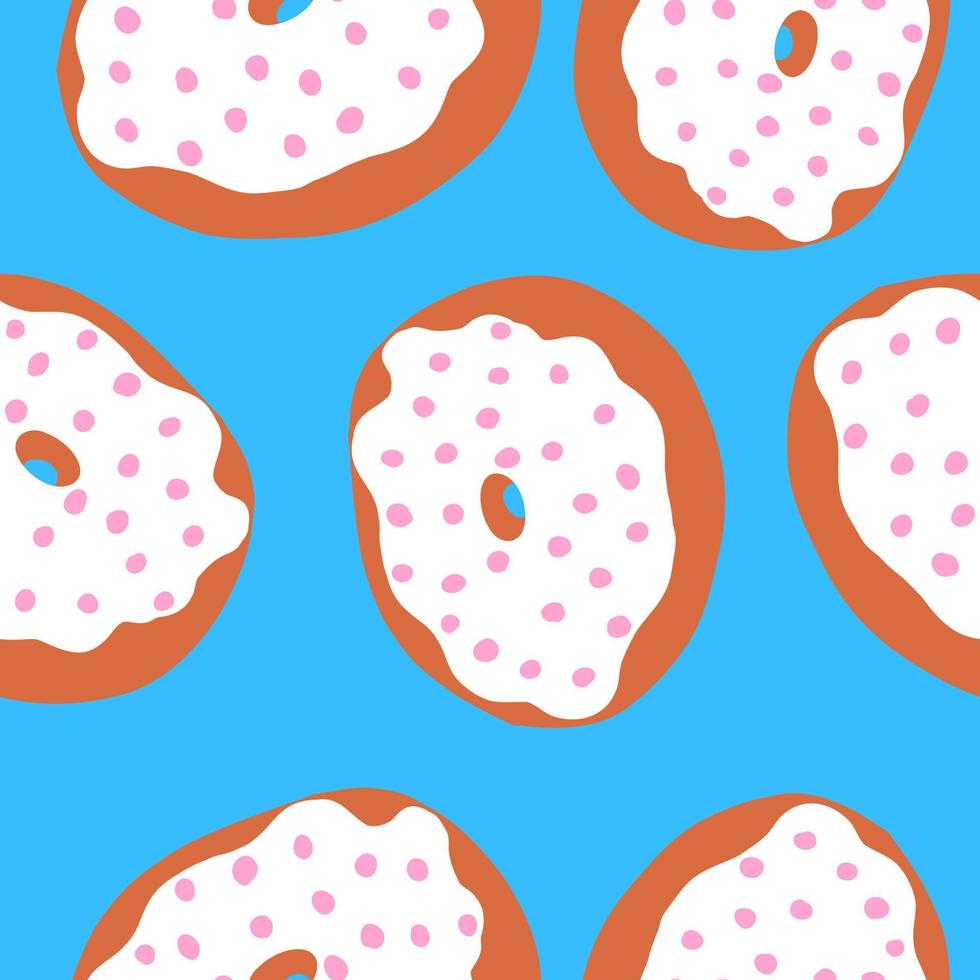 Seamless pattern of donut rings in cartoon flat style. Pink balls sprinkles on a white cream with toasted base. Sweet bakery. Vector colorful illustration isolated on blue background.