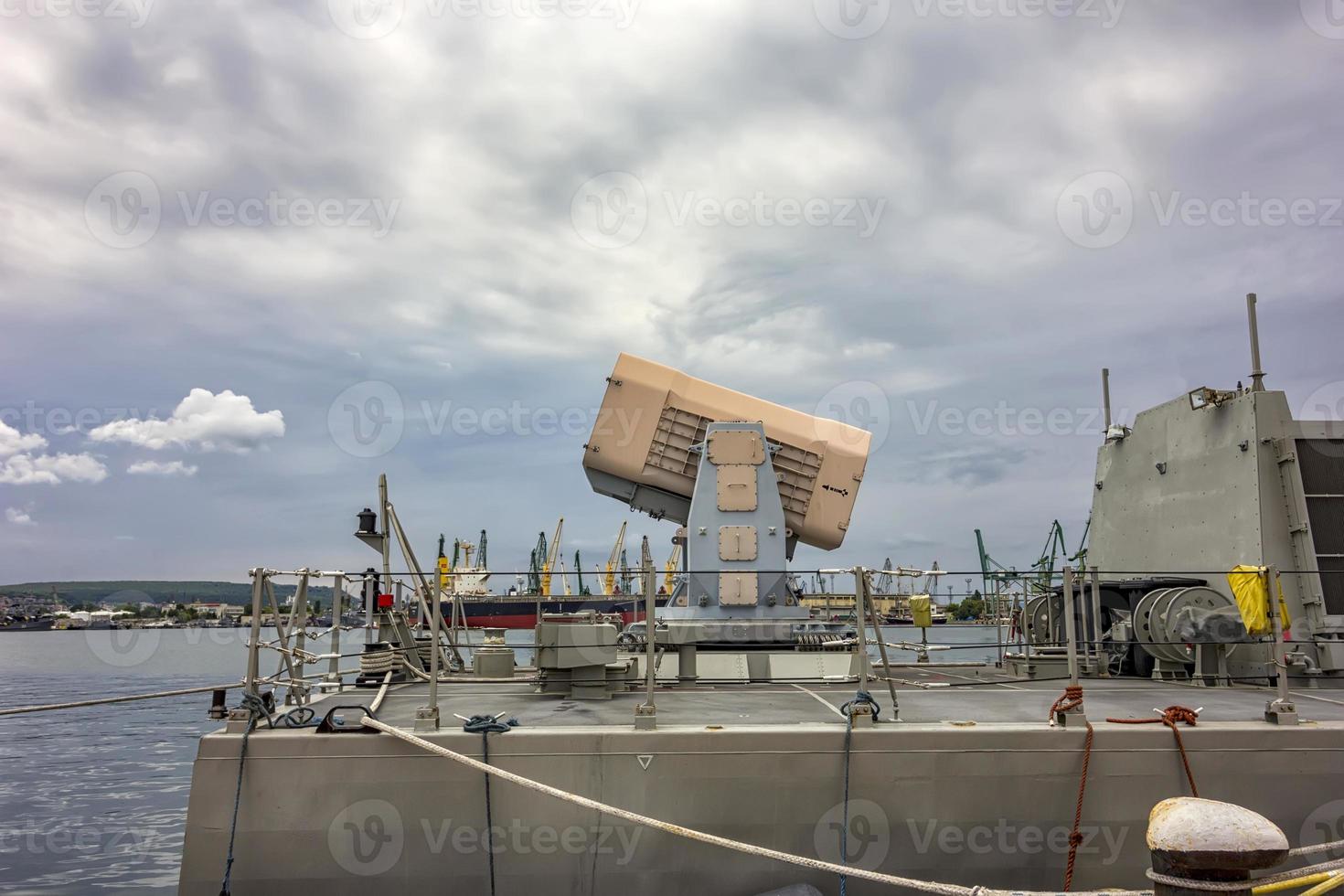 The cassette missile system onboard a frigate.A dangerous weapon. The battery of guns for the defense of military ships. photo