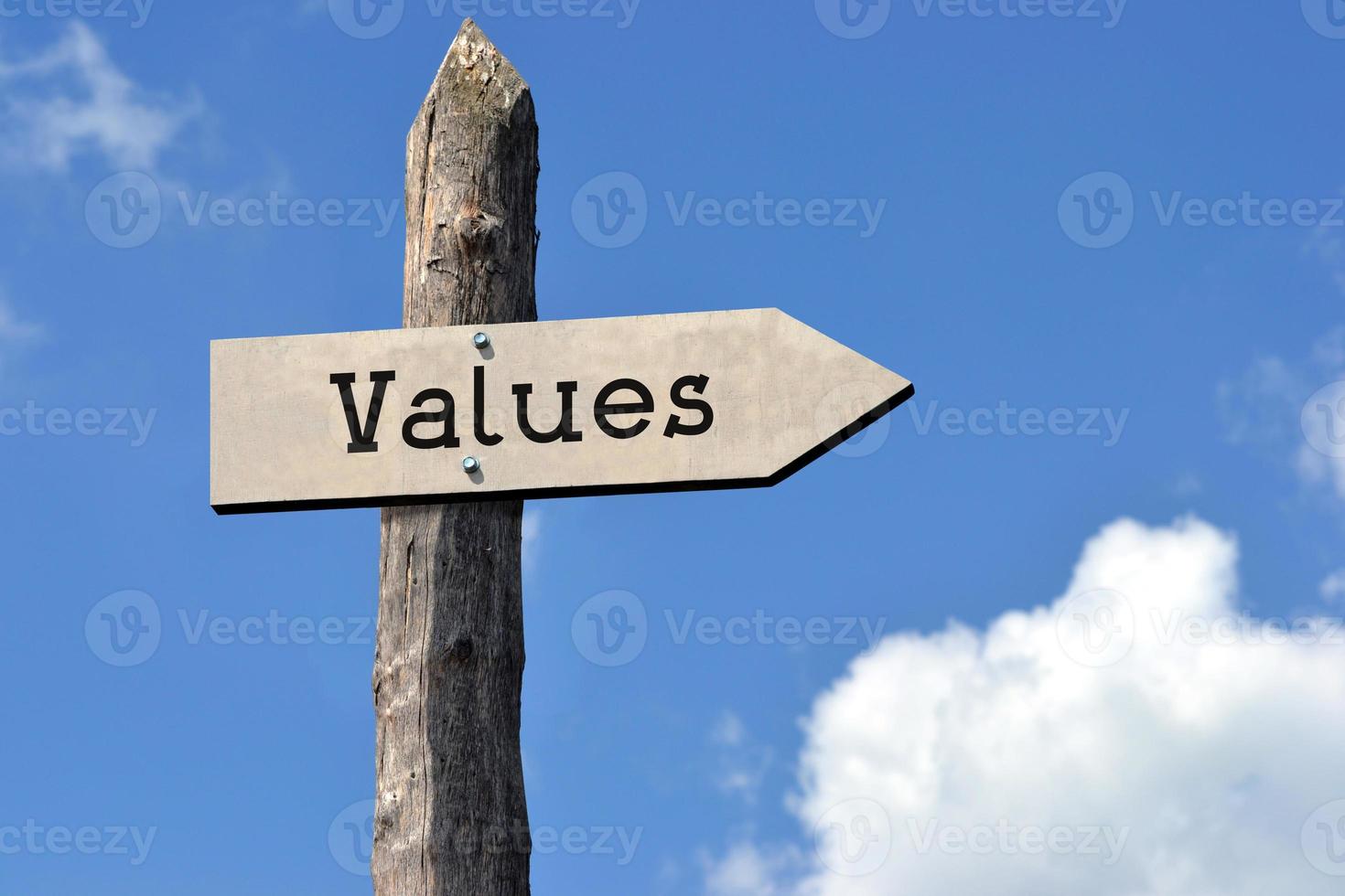 Values - Wooden Signpost with one Arrow, Sky with Clouds photo