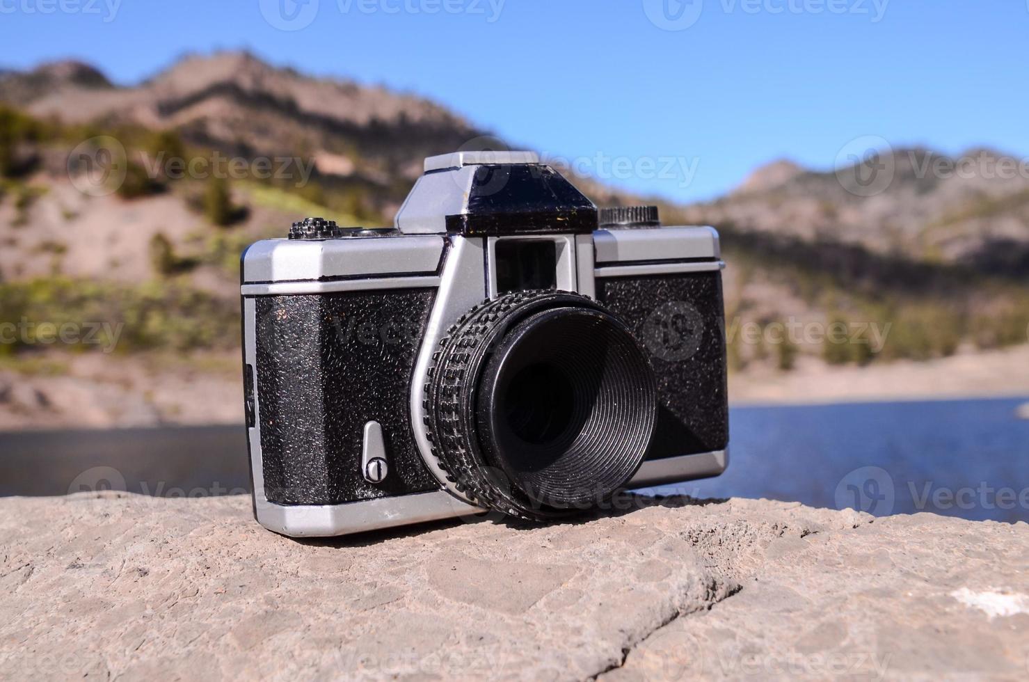 Camera on the rock photo