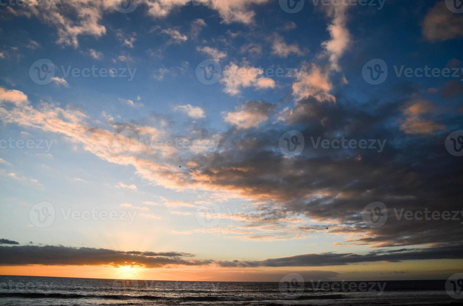 Sunset over the sea photo
