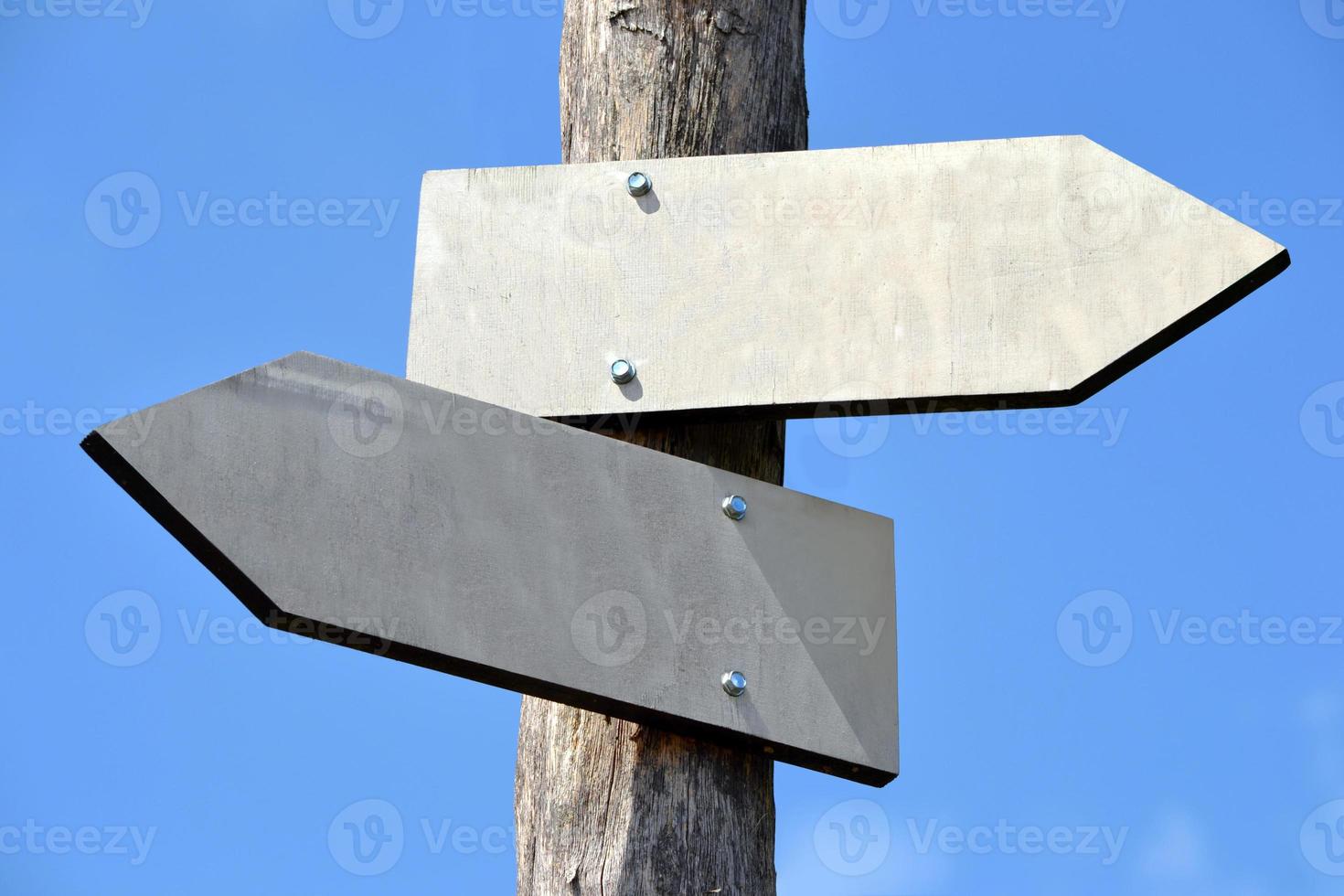 Wooden Signpost with Clear Two Arrows photo