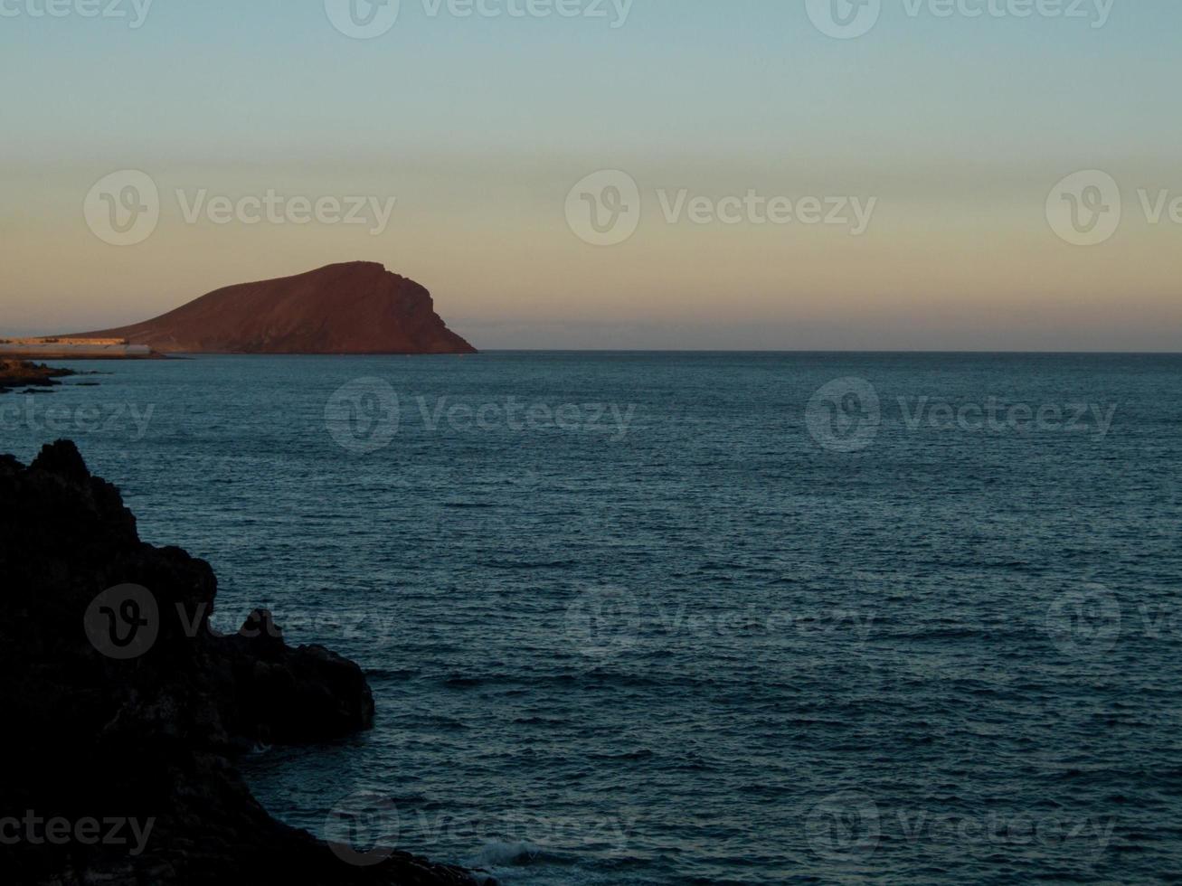 Sunset over the sea photo