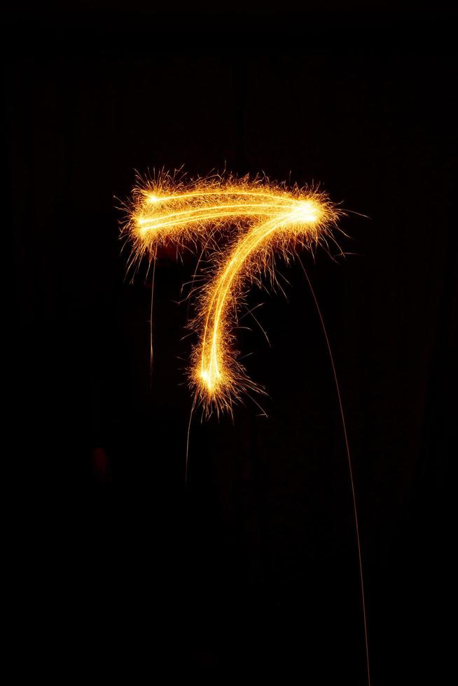 made with sAlphabet element made with sparklers ready for your inscriptions on black background photo