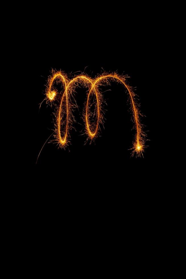 made with sAlphabet element made with sparklers ready for your inscriptions on black background photo