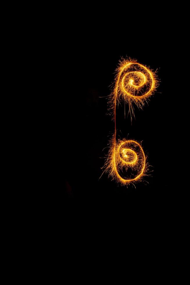 Element made with sparklers ready for your inscriptions on black background photo