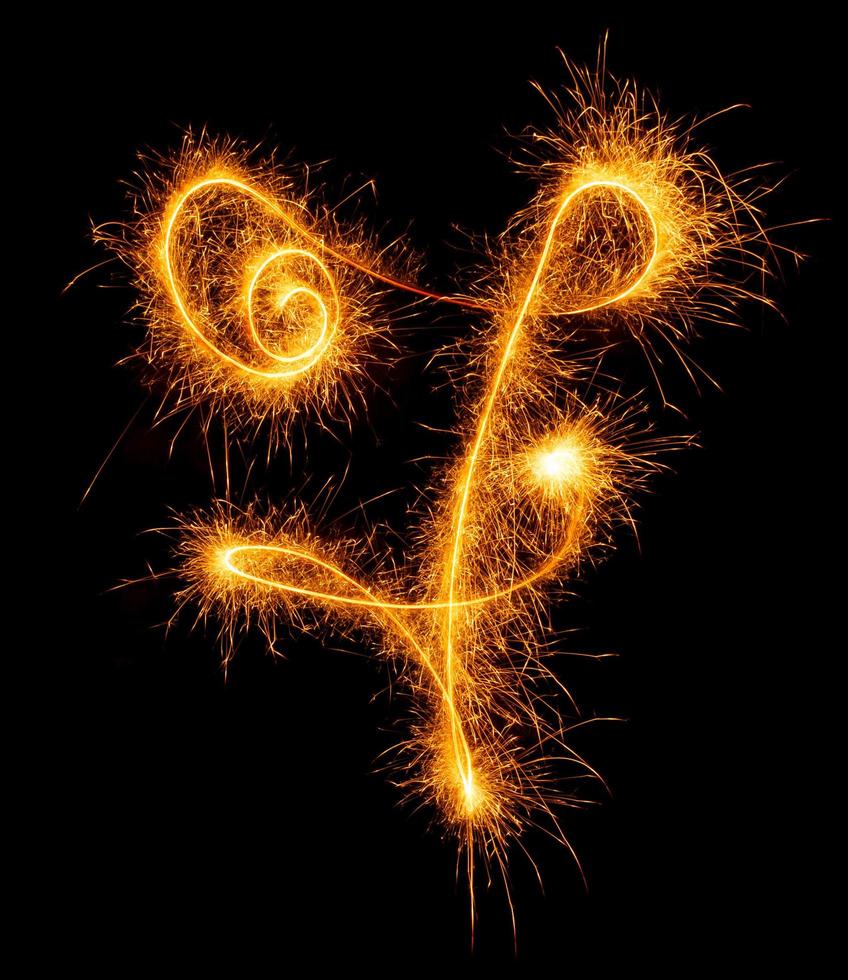 made with sAlphabet element made with sparklers ready for your inscriptions on black background photo