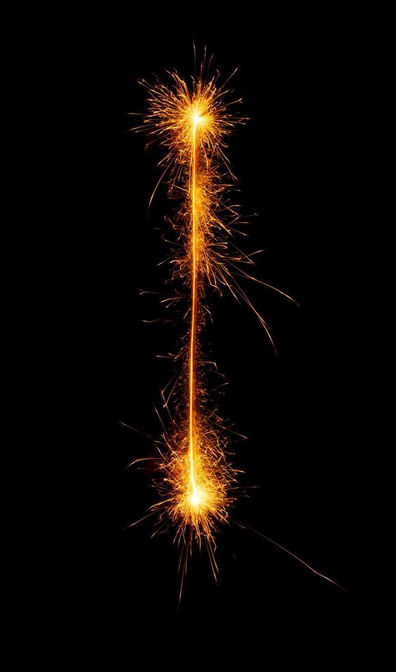 made with sAlphabet element made with sparklers ready for your inscriptions on black background photo