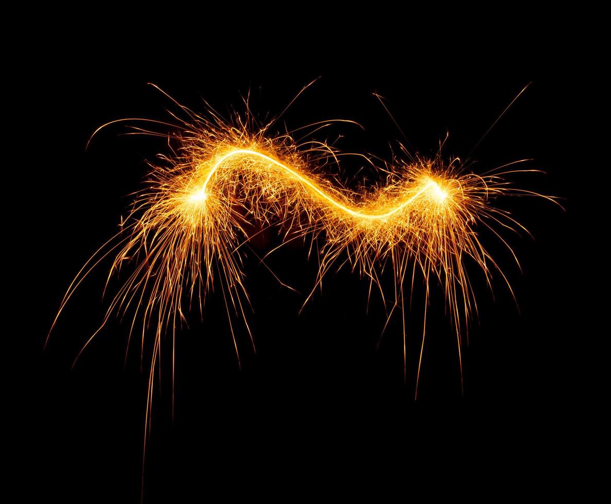 made with sAlphabet element made with sparklers ready for your inscriptions on black background photo
