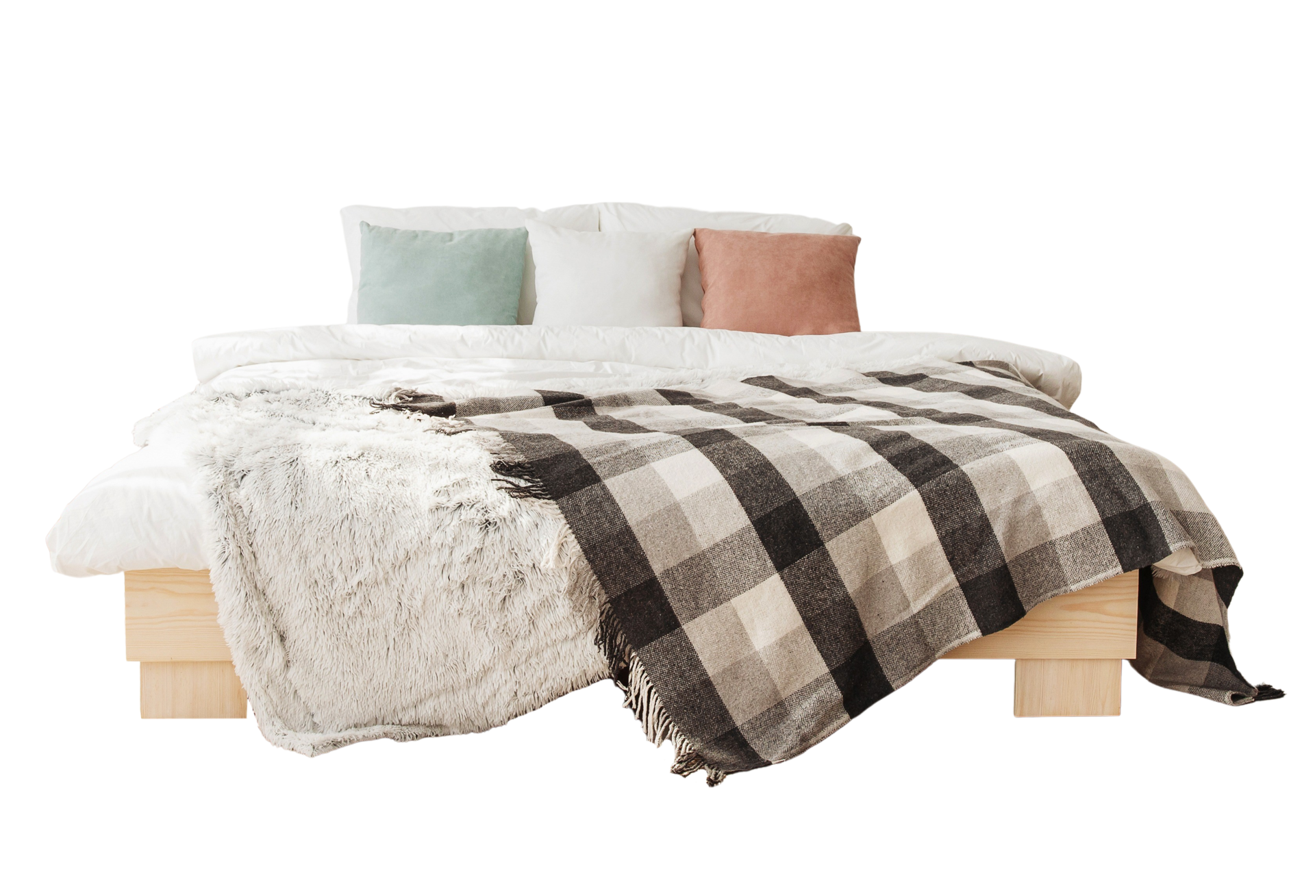 White bed with colorful cushions and blanket isolated on a transparent