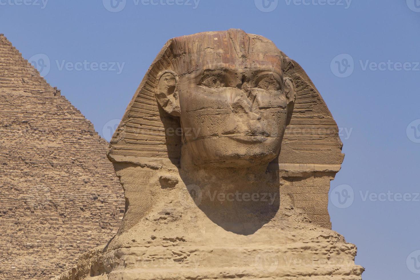 Great Sphinx in front of pyramid of Khafre in Giza photo