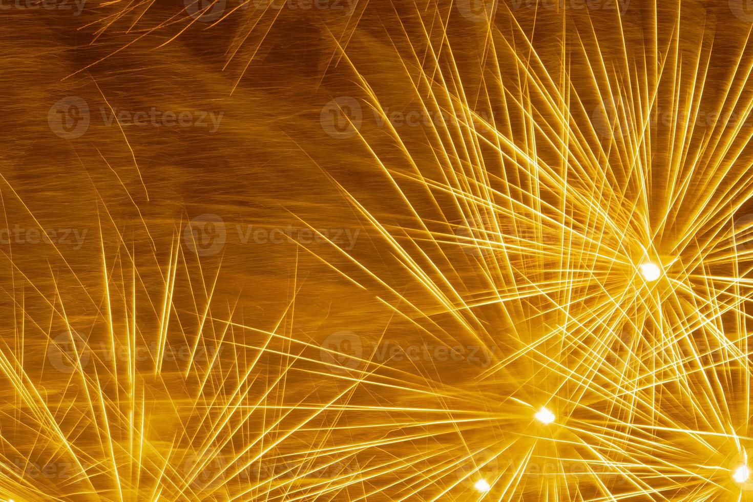 yellow fireworks in night sky photo