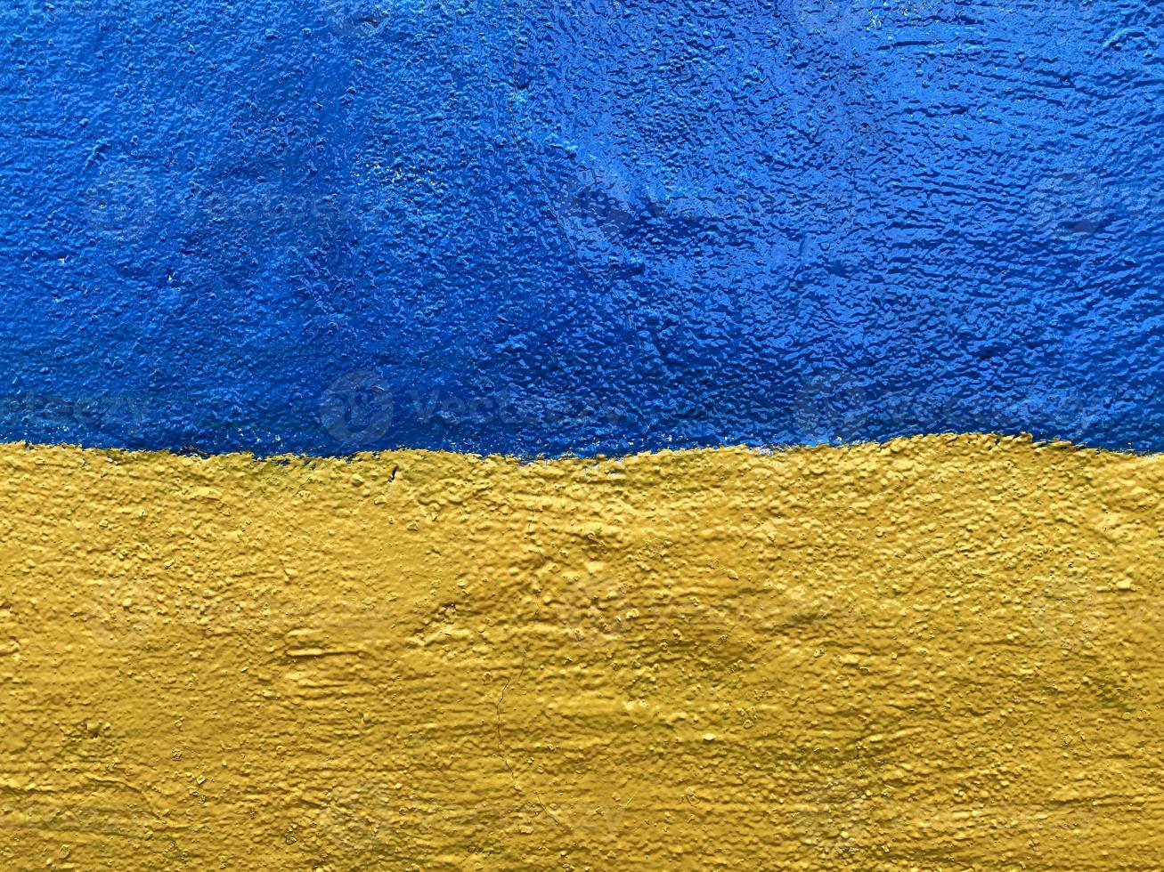 Ukrainian flag painted on wall photo