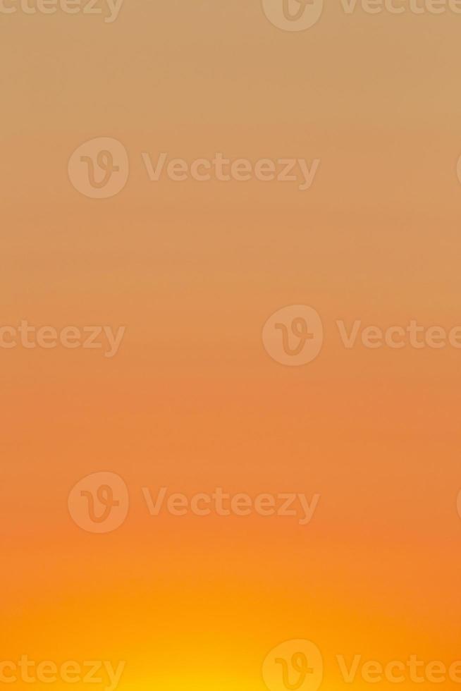 clear orange sky at sunset photo