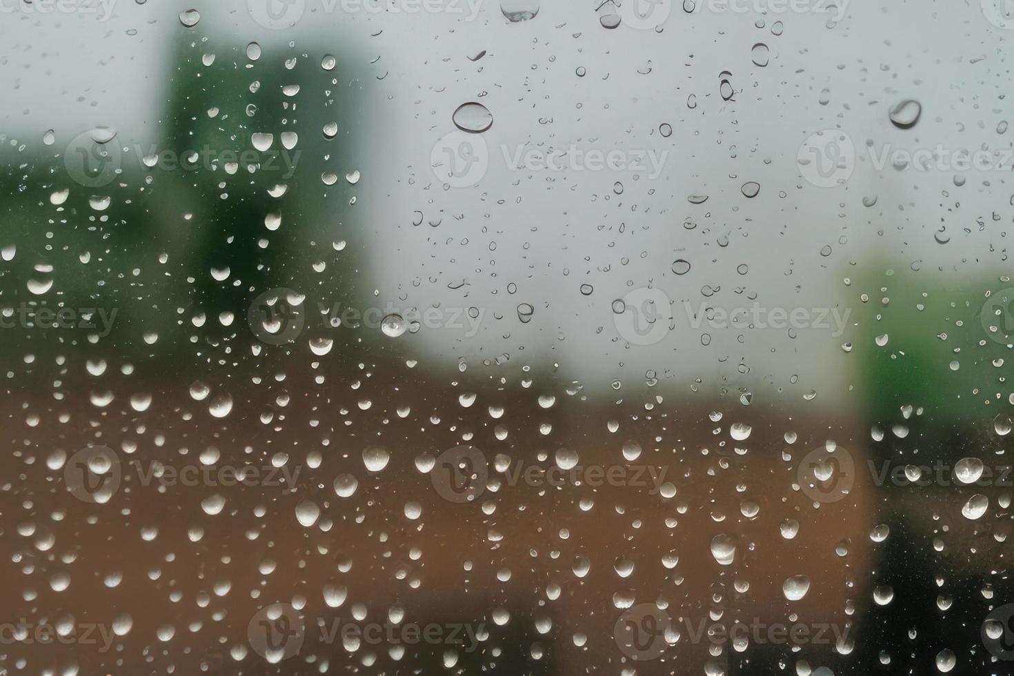 small water drop on the glass window, minimalistic design backdrop with copy space photo
