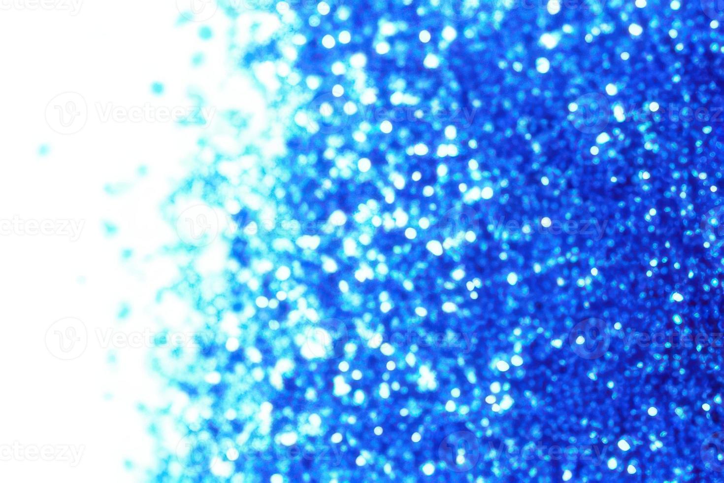 blue background with gradient, bokeh and sparkles on blue background photo