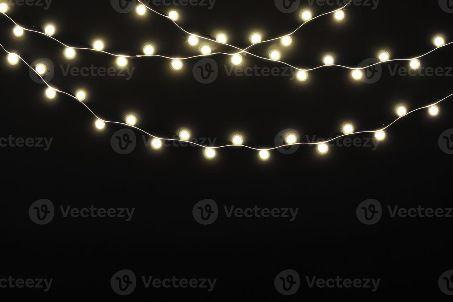 Glowing Yellow LED on a Black Background, Futuristic Yellow LED Illumination on a Dark Background photo