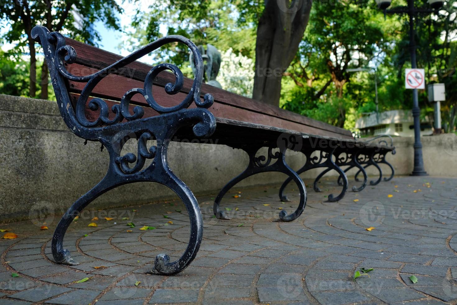 Vintage Long Bench in the Park. photo