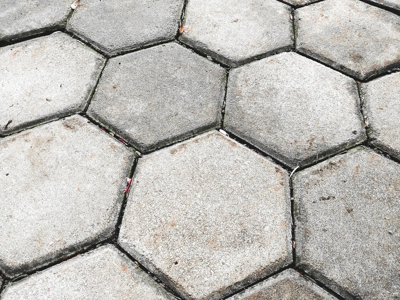 pavimentación bloques ese son instalado pulcramente y regularmente en el suelo entonces ese el carreteras son no lodoso porque de agua o cuando eso lluvias foto