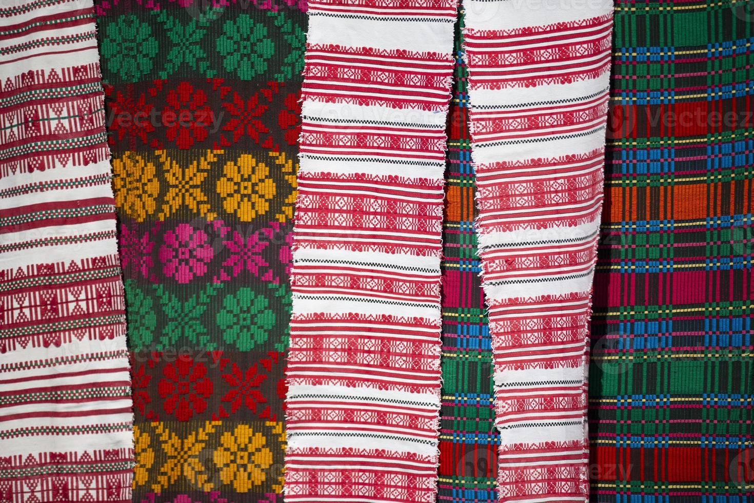 Slavic embroidered towels. National Ukrainian or Belarusian ethnic patterns on the fabric. photo