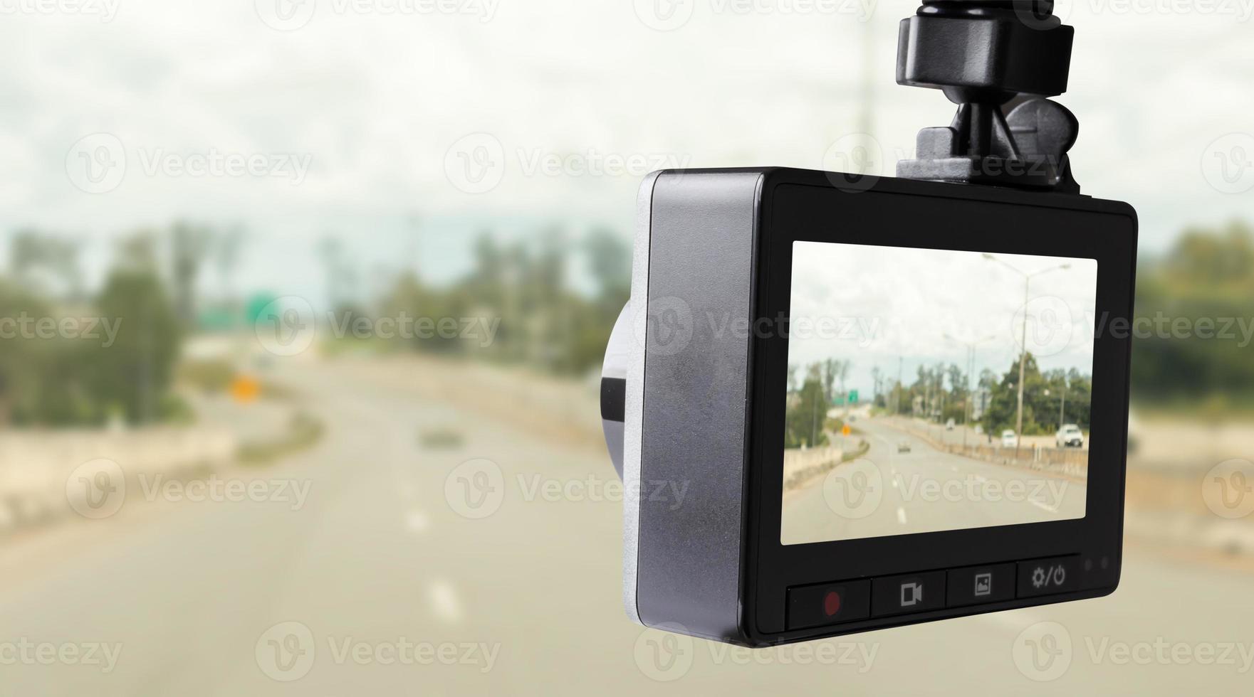 Car CCTV camera video recorder for driving safety on the road photo