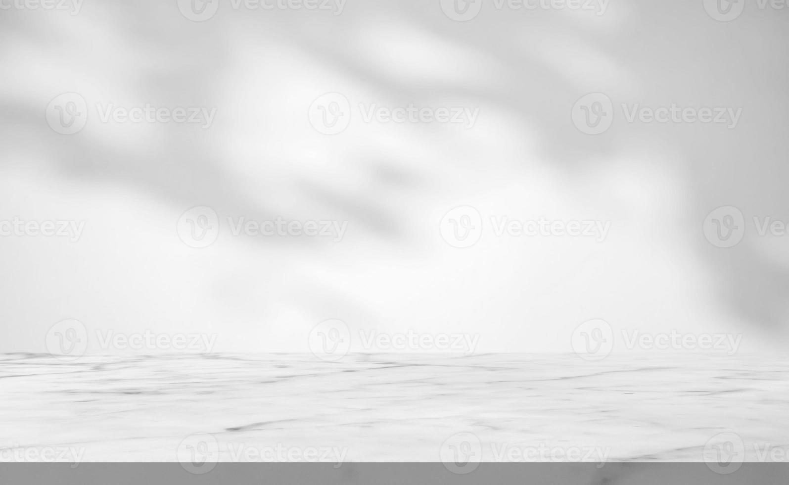 Marble table with tree shadow drop on white wall background for mockup product display photo