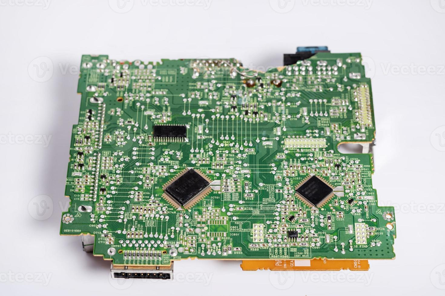 Main Board on a white background. photo of a whole old failed motherboard