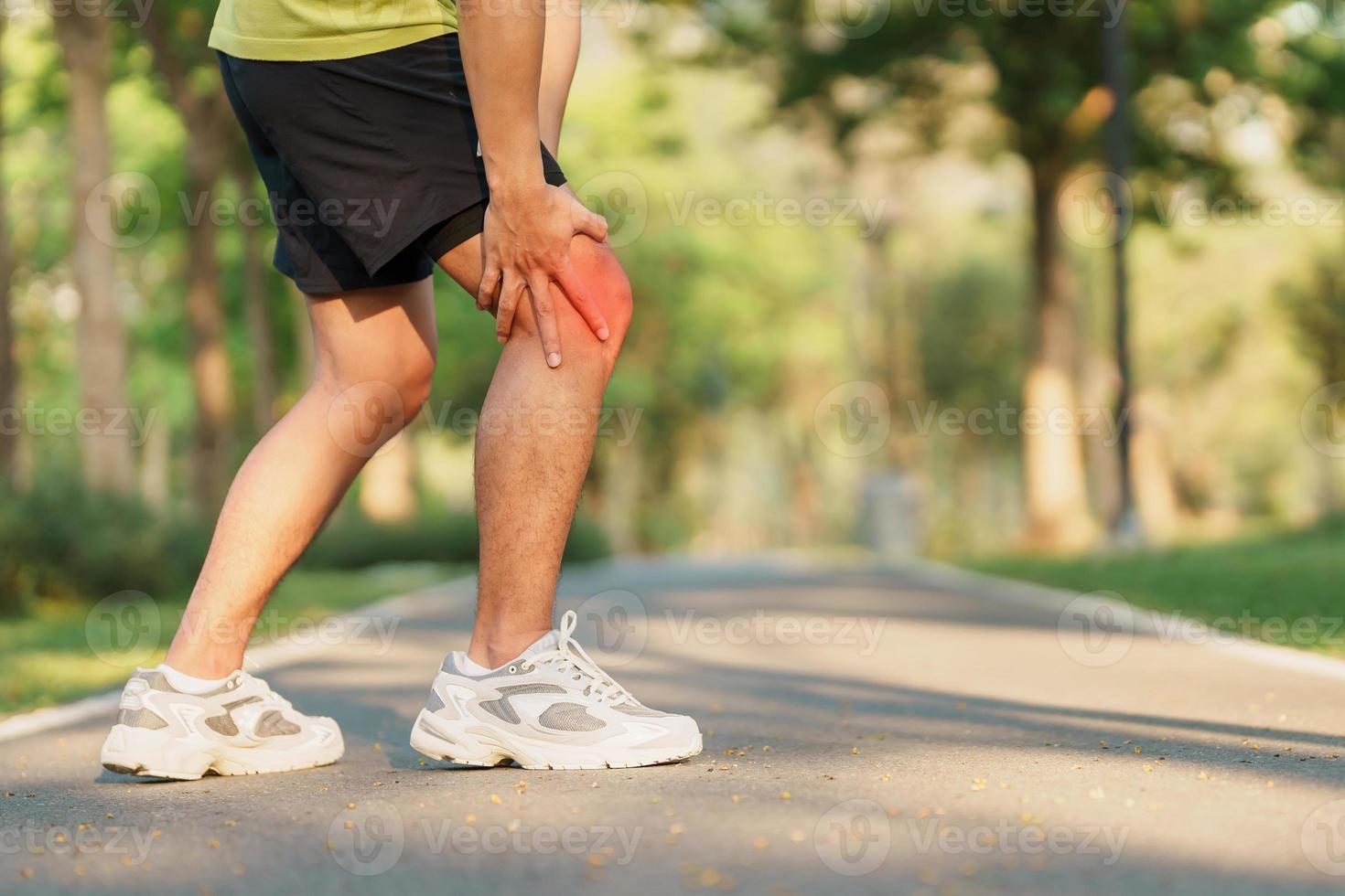 Young adult male with muscle pain during running. runner have knee ache